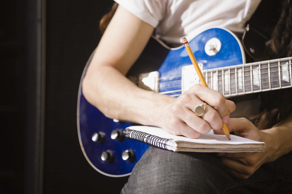 Man writing song